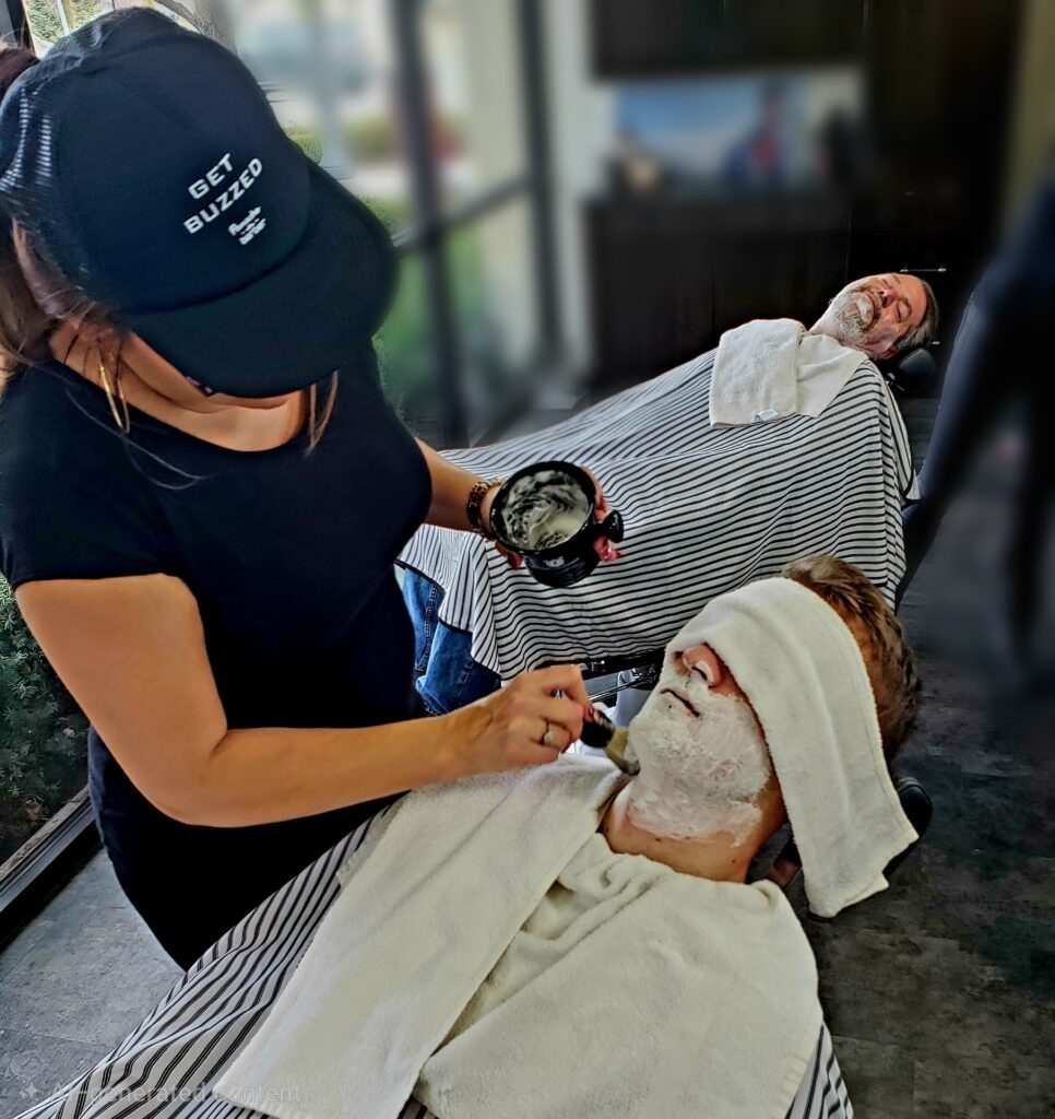 Clients of Panache Barbershop in Meridian, Idaho getting a straight razor shave and hot towel treatment as a Father's Day gift from their family.