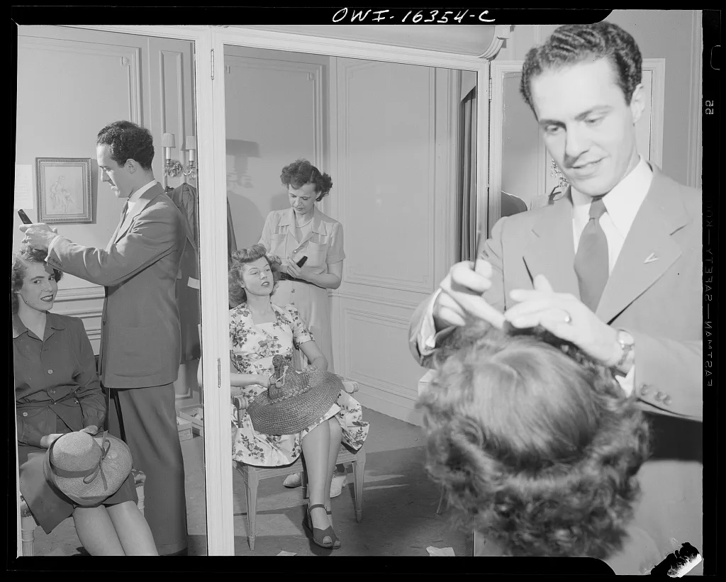 An image from the USA Library of Congress, showing a 1950's hair and beauty salon, something that became a popular meeting place for women in the prosperous post-WWII era in American cities and suburbs.