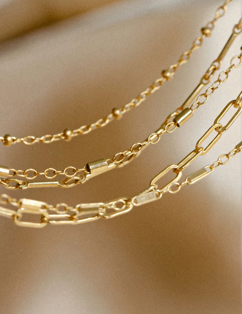 Permanent jewelry in Meridian, Idaho. Get linked with your best friends, family members, bridal party today at Panache. Image of 14k Gold Filled Chains, sterling silver also available. 