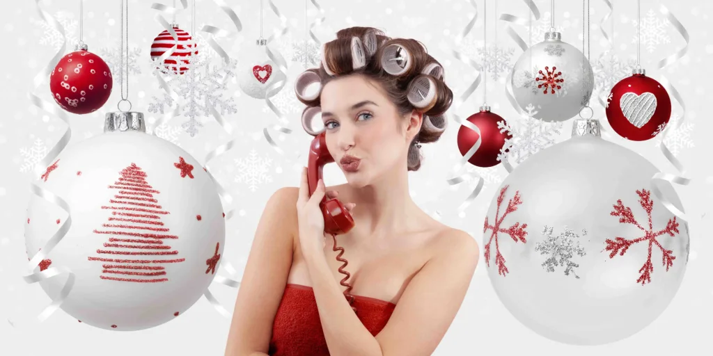 Woman in hair curlers, surrounded by holiday season decorations, calling her favorite hair salon in Meridian, Idaho and holiday pre booking her November and December beauty appointments at Panache Hair Studio early.